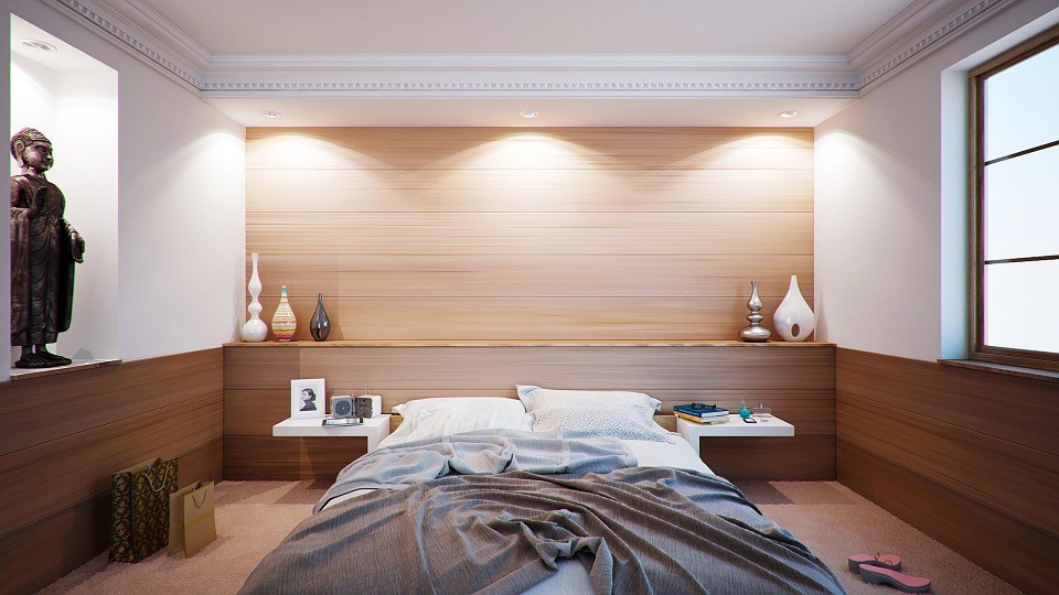 bed in a bright room bed in a bright room