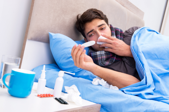 young man having colds and flu