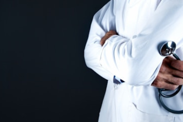 physician in white robe - featured image